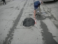 地震で壊れた道路の部分補修